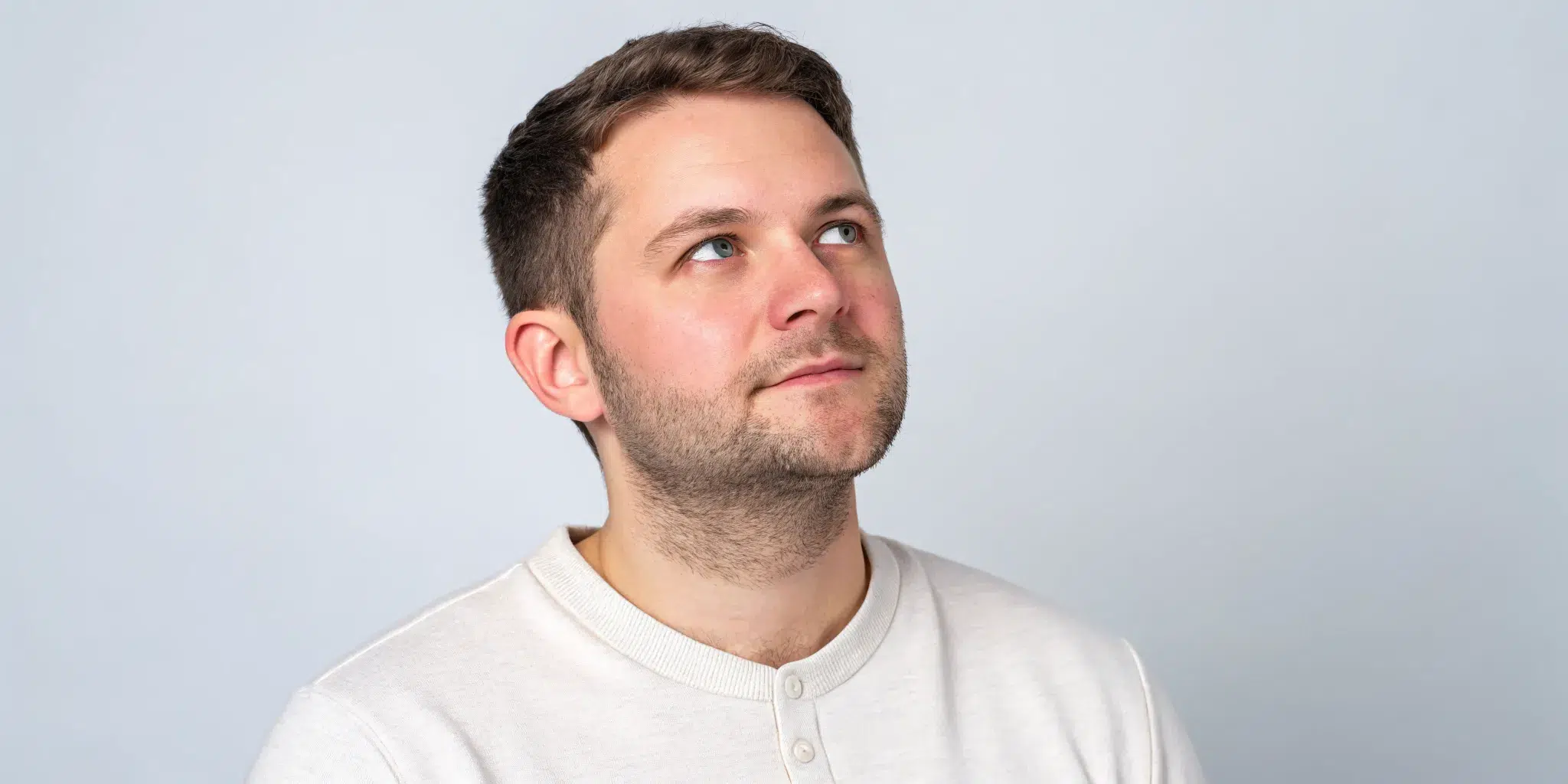 A man's face with fair skin, an example of a Fitzpatrick skin type.