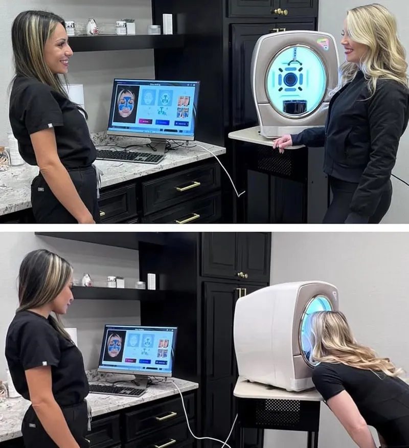 Two aesthetic professionals review a facial analysis on a monitor beside an ImagePro skin imaging system.